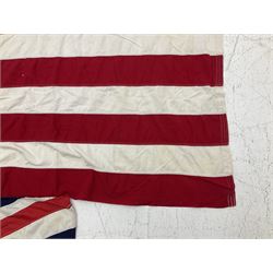 American 100% cotton 'Stars and Stripes' flag by The Valley Forge Company Inc. Pennsylvania 140 x 260cm; and a Union flag 88 x 176cm (2)