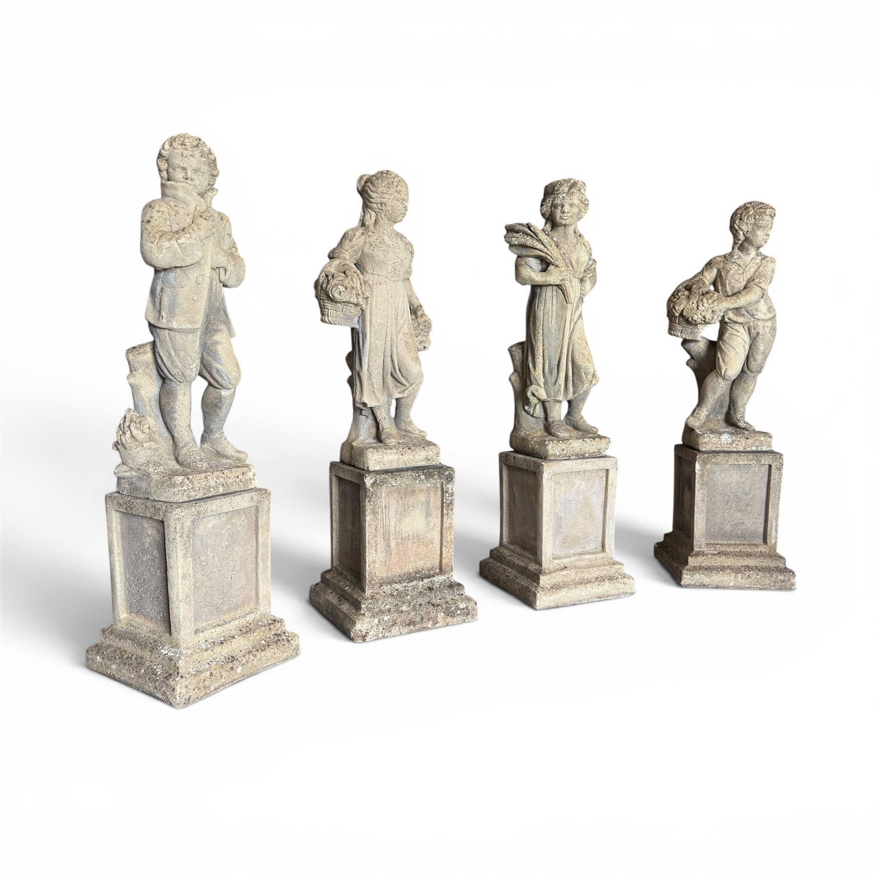 The Four Seasons - set of four traditional cast stone garden figures, in a weathered finish, stamped 'Lucas'