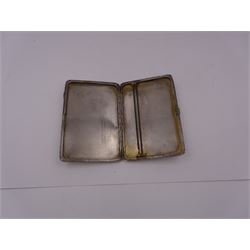 1930s silver cigarette case, of rectangular form with rounded corners, decorated with engine turned and geometric detail, opening to reveal personal engraving, hallmarked Sampson Mordan & Co, London 1933, H12.5cm