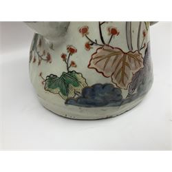 Large Japanese Imari porcelain figure, modelled as a Bijin, wearing a long kimono decorated with apple blossom and leafy branches on a white ground, with gilt detailing, possibly Edo period, H63cm