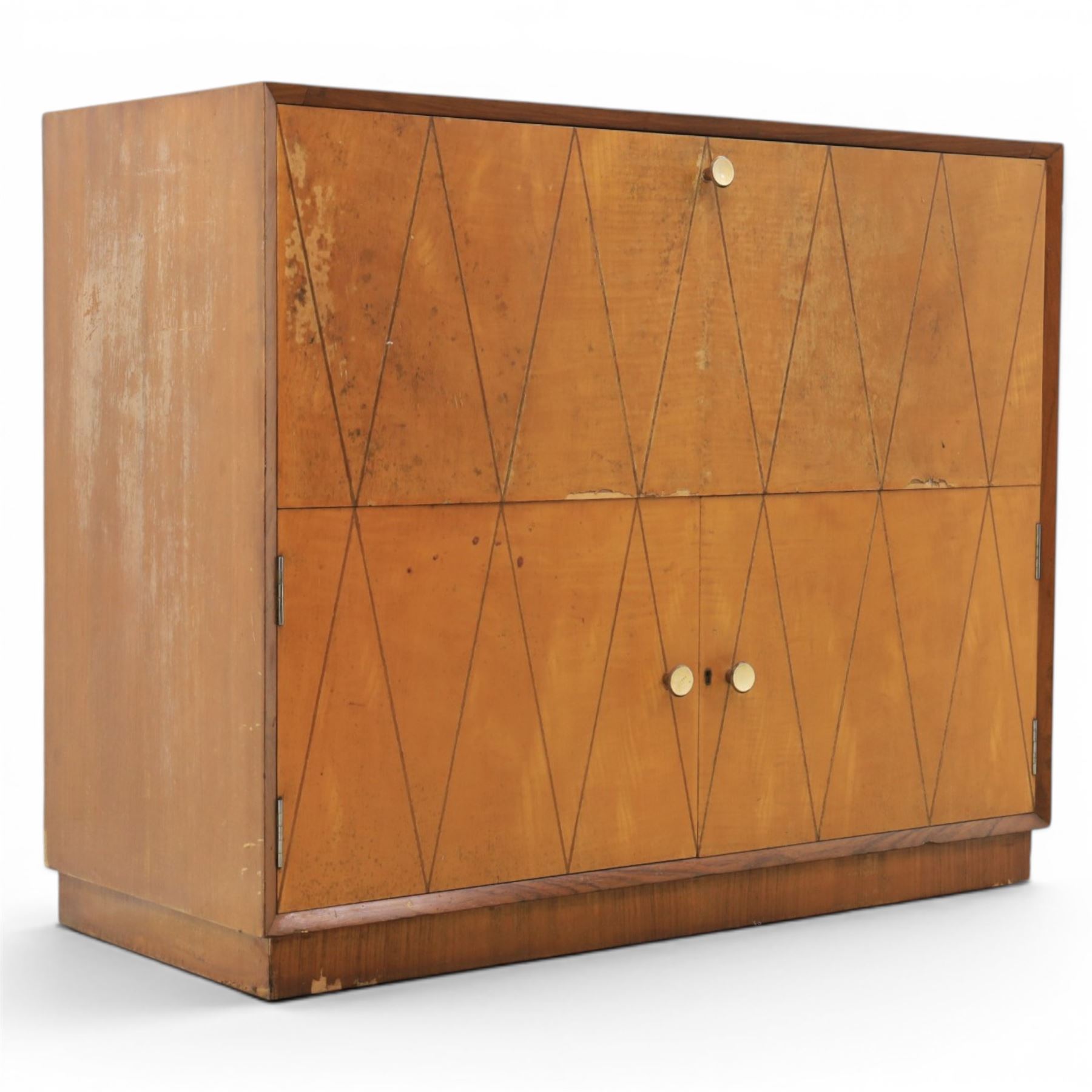 Teak mid 20th century fall front cabinet, hinged top with geometric inlay front, above twin cabinet doors