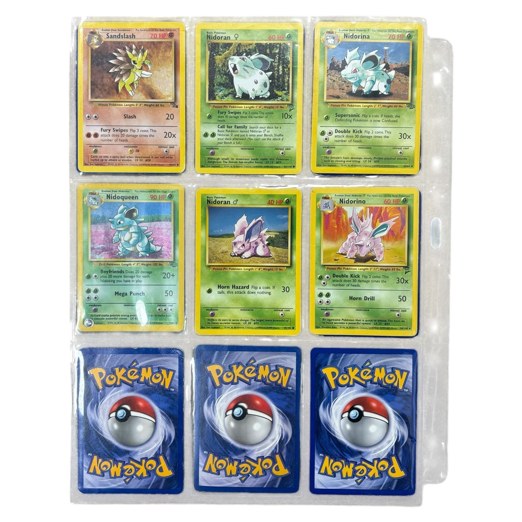 Collection of mainly vintage Pokemon cards including Charizard Base Set Holographic number 4/102 and two Ancient Mew 2000 promo cards, some housed within plastic wallets and some loose