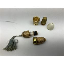 Collection of sewing accessories, to include tape measures, two in the form of drums, one in the form of mandolin, thimble holders with examples in the form of a chest, egg shaped etc  