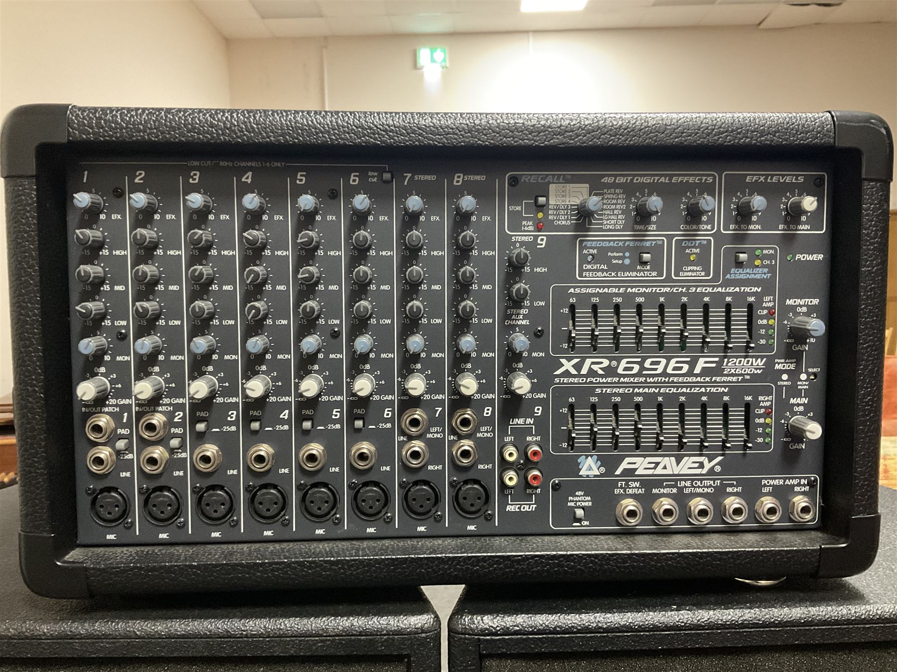 Peavey XR-696F 1200W Amplifier, serial no.K0241228, L47cm; with two Peavey UL bass bins L56cm and two Peavey top speakers L45cm with connecting rods; all with covers; and quantity of heavy duty cables, two microphone cables and microphone stand