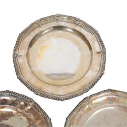 Set of three late 19th century Mappin Brothers silver plated plates, the pie crust rims with oblique gadrooned edge, each engraved with dragon armorial crest, D26cm