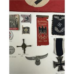 WWII Iron Cross, together with Hitler Youth pin, NSDAP arm band, Deutsches Olympia silk badge and other German insignias 