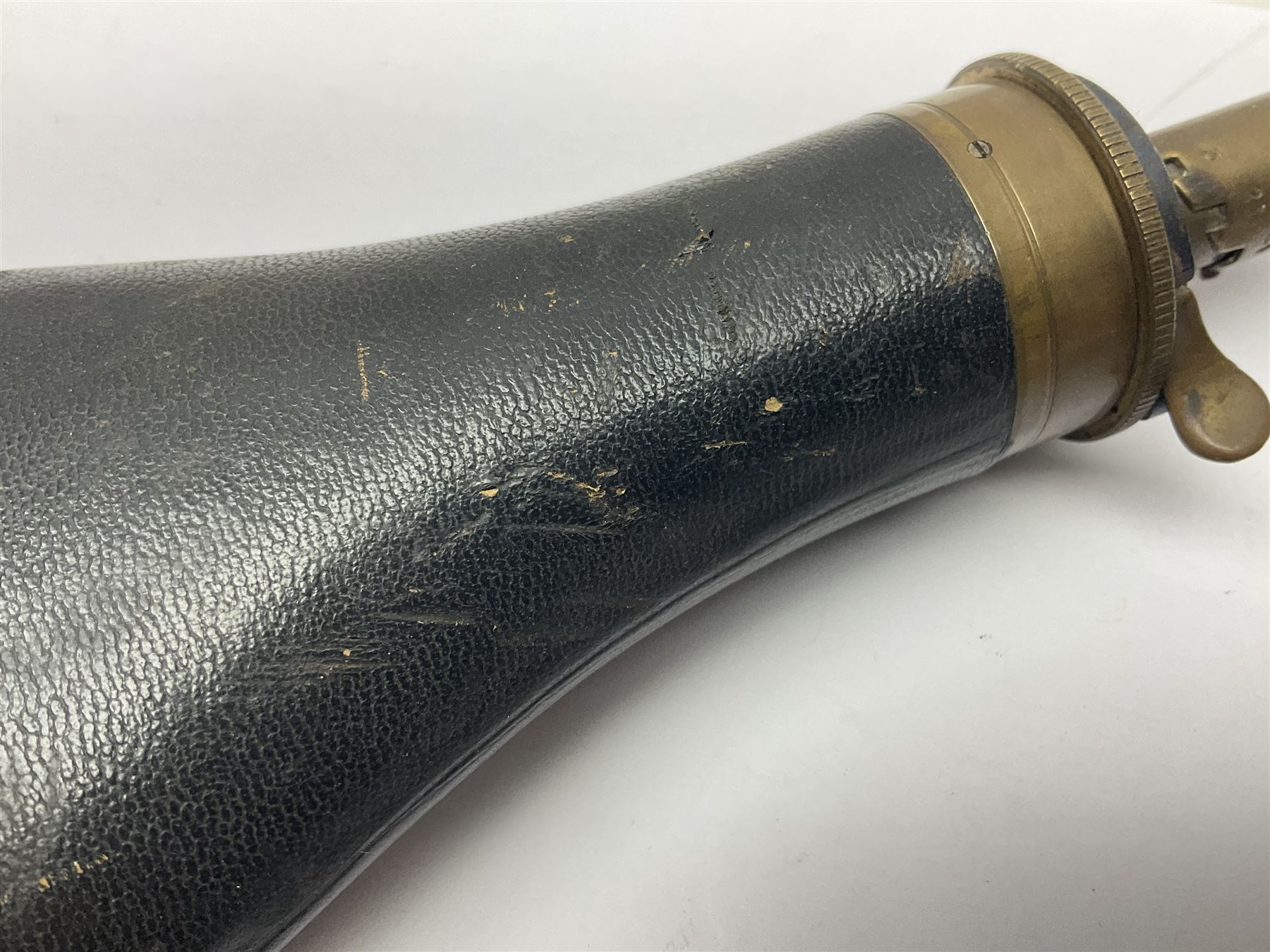 19th century James Dixon & Sons leather covered powder flask with patent action adjustable shot measure to dispense 2 1/4 - 3 drams; marked Parker Hale Ltd. Birmingham England L20cm