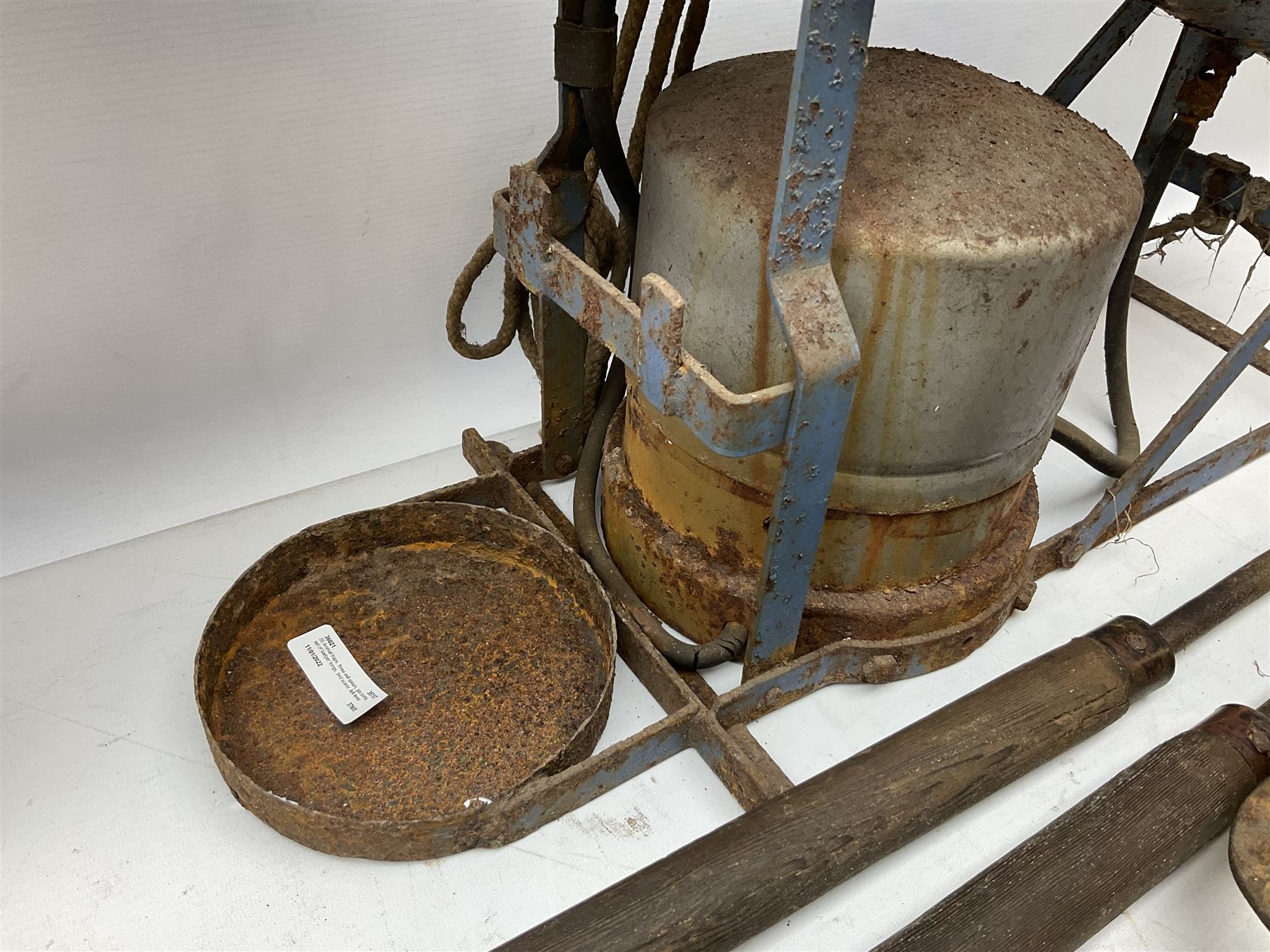 Blue and red painted gas powered bird / pest scarer, bearing label 'Exid bird & pest scarer, imported by C.R.E.A.C.O Hadleigh, Essex', , copper and brass Cymag gas hand pump, three eel spears and a set of badger tongs. Auctioneer's Note: These traps are sold as artefacts for ornamental purposes only as the use of some of them is illegal.