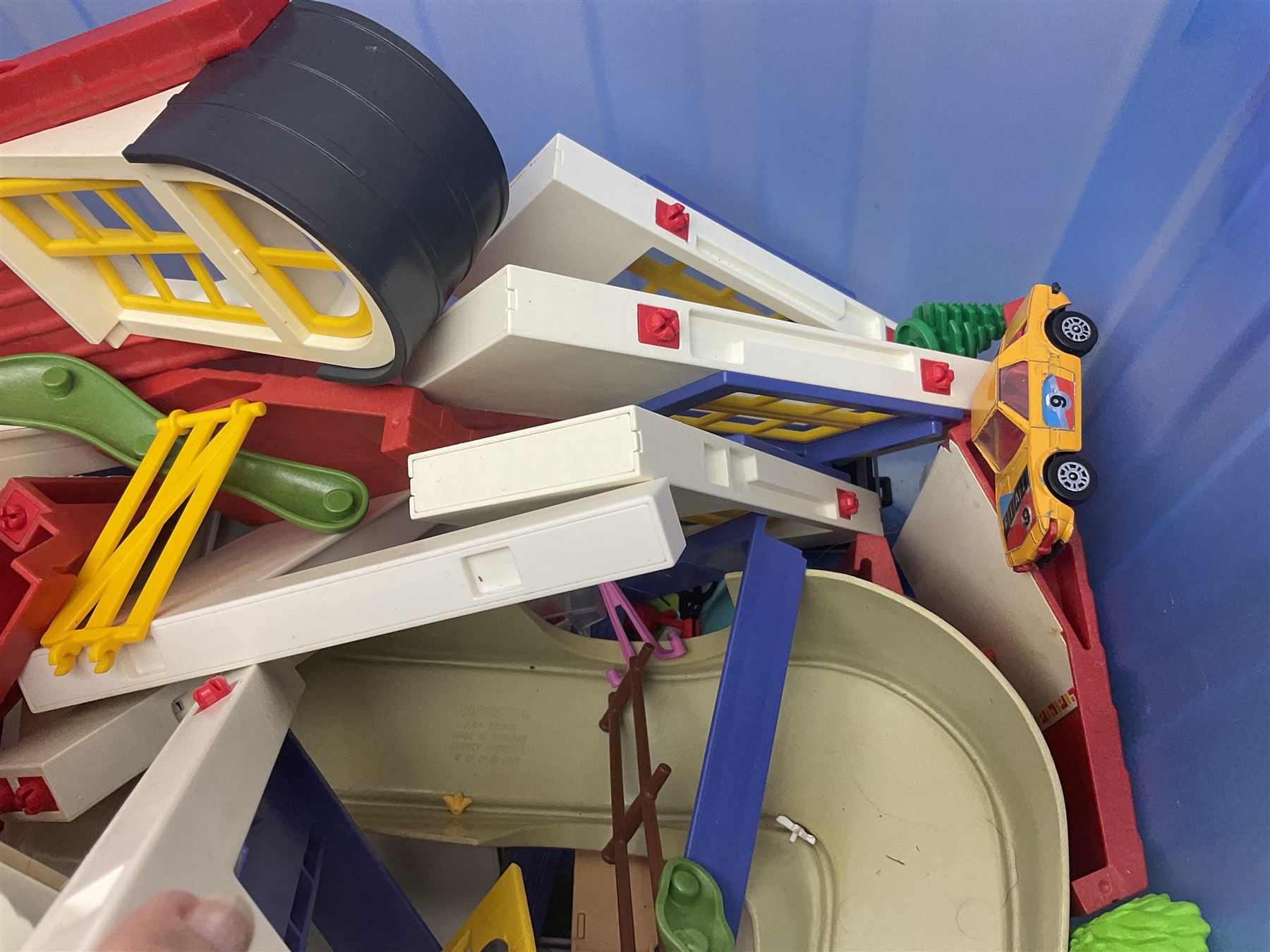 Quantity of loose Playmobil figures, playset parts and accessories, with small amount of Britains Ltd figures etc, in two boxes 