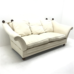 Knole style two seat sofa, upholstered in a beige fabric, turned supports, W200cm 