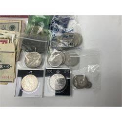 Great British and World coins and banknotes, including two Queen Victoria 1887 florins, King George V 1930 halfcrown, pre decimal pennies and other denominations, five Queen Elizabeth II five pound coins, United States of America 1964 Kennedy half dollar, German and other banknotes etc