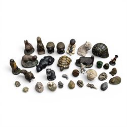 Collection of 33 small glazed cast stone garden animals and figures
