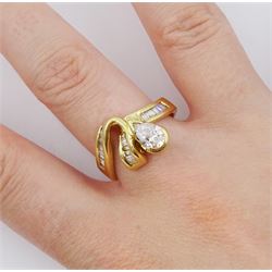 18ct gold diamond pear and baguette cut diamond ring, stamped 750, principle pear cut diamond of approx 0.75 carat, total diamond weight approx 1.25 carat