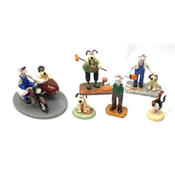 A group of six Coalport Wallace & Gromit figurines, comprising 'Hold on Gromit' no880/2000 with certificate, 'Decorating in Techno Trousers' no1195/2000 with certificate, 'Reading for Take Off', 'Do something Gromit', 'Feathers in disguise', 'Happy Birthday Gromit', each in maker's box with accompanying swing tag.