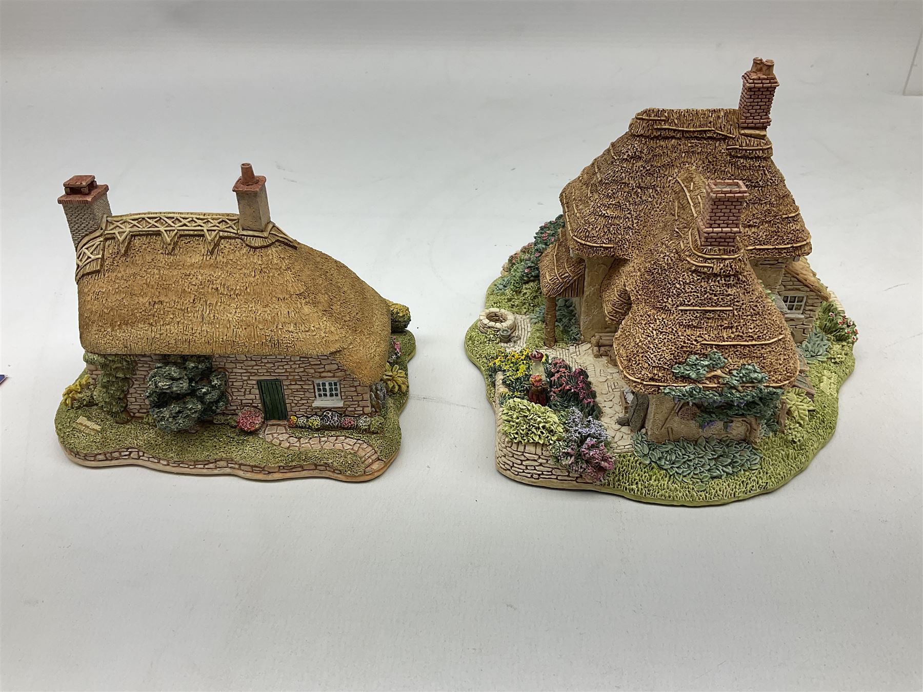 Seven Lilliput Lane cottages, comprising five limited edition examples, one French collection example and one Dutch collection, to include Queen of Windemere, Penkill Castle and Gertrude's Garden, all with boxes, four with deeds