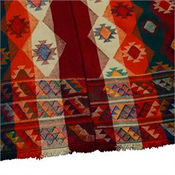 Southwestern Persian Jajim kilim, flat woven in bold bands of crimson, orange, cream, and indigo, decorated with rows of hooked diamond and star motifs 