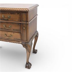 Georgian design mahogany sideboard, the rectangular top with moulded gadrooned edge, fitted with a central frieze drawer flanked by cupboard doors, raised upon cabriole legs terminating in ball and claw feet