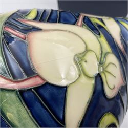Moorcroft vase, of bottle form, decorated in the Orchid Arabesque pattern by Emma Bossons, circa 2002, H31.5cm, with original box 
