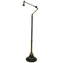 Early 20th century brass adjustable floor lamp, Royal Doulton decorative ceramic base embellished with raised floral and scroll patterns, stamped, brass column and adjustable arms terminating in brass bulb holder