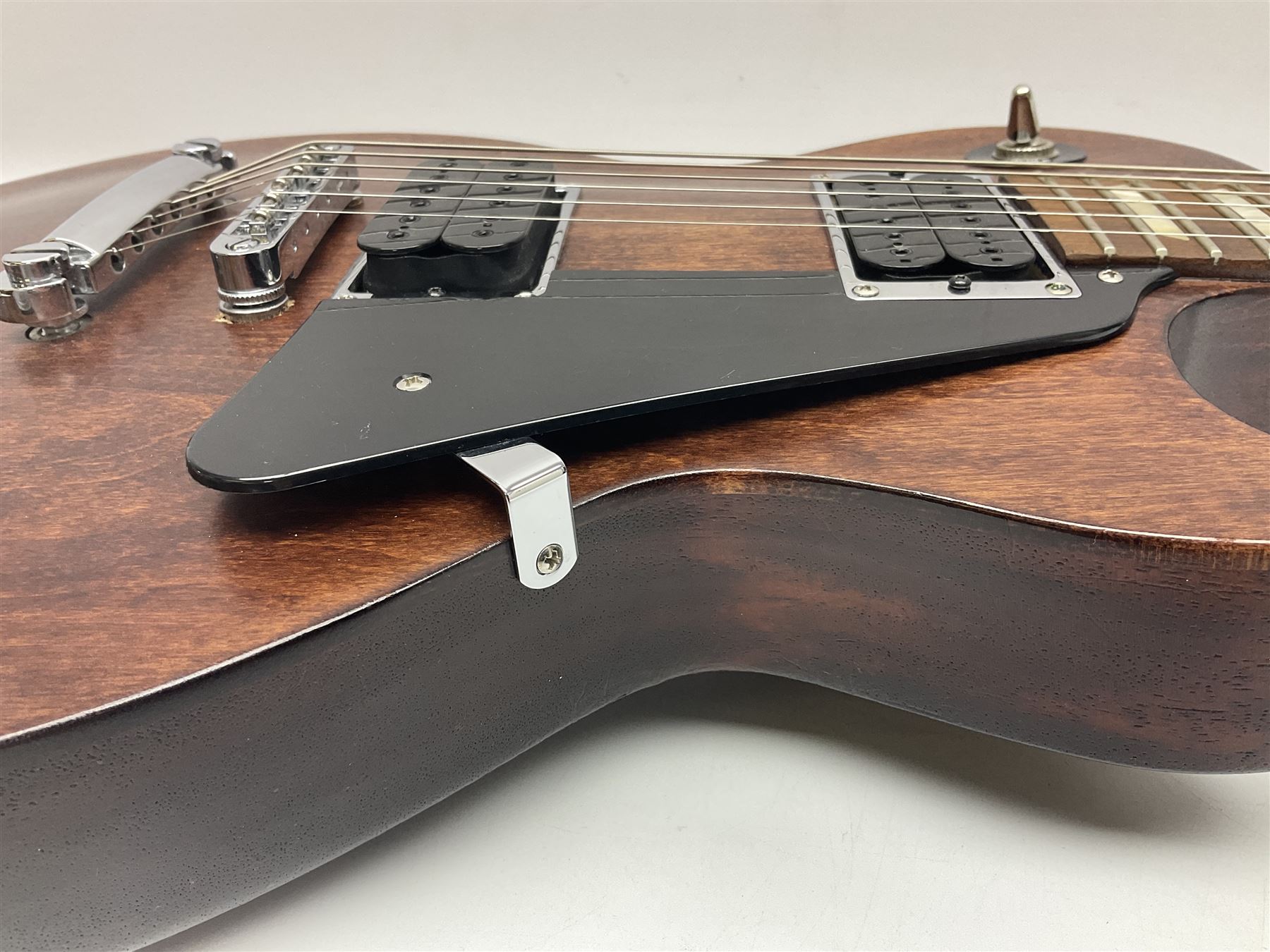 2012 American Gibson Les Paul Studio electric guitar, retro fitted with iron gear pick-ups, push-pull 'pots', roller bridge, string butler and locking machines, serial no.115321594, L99cm overall; in Gibson soft carrying case.