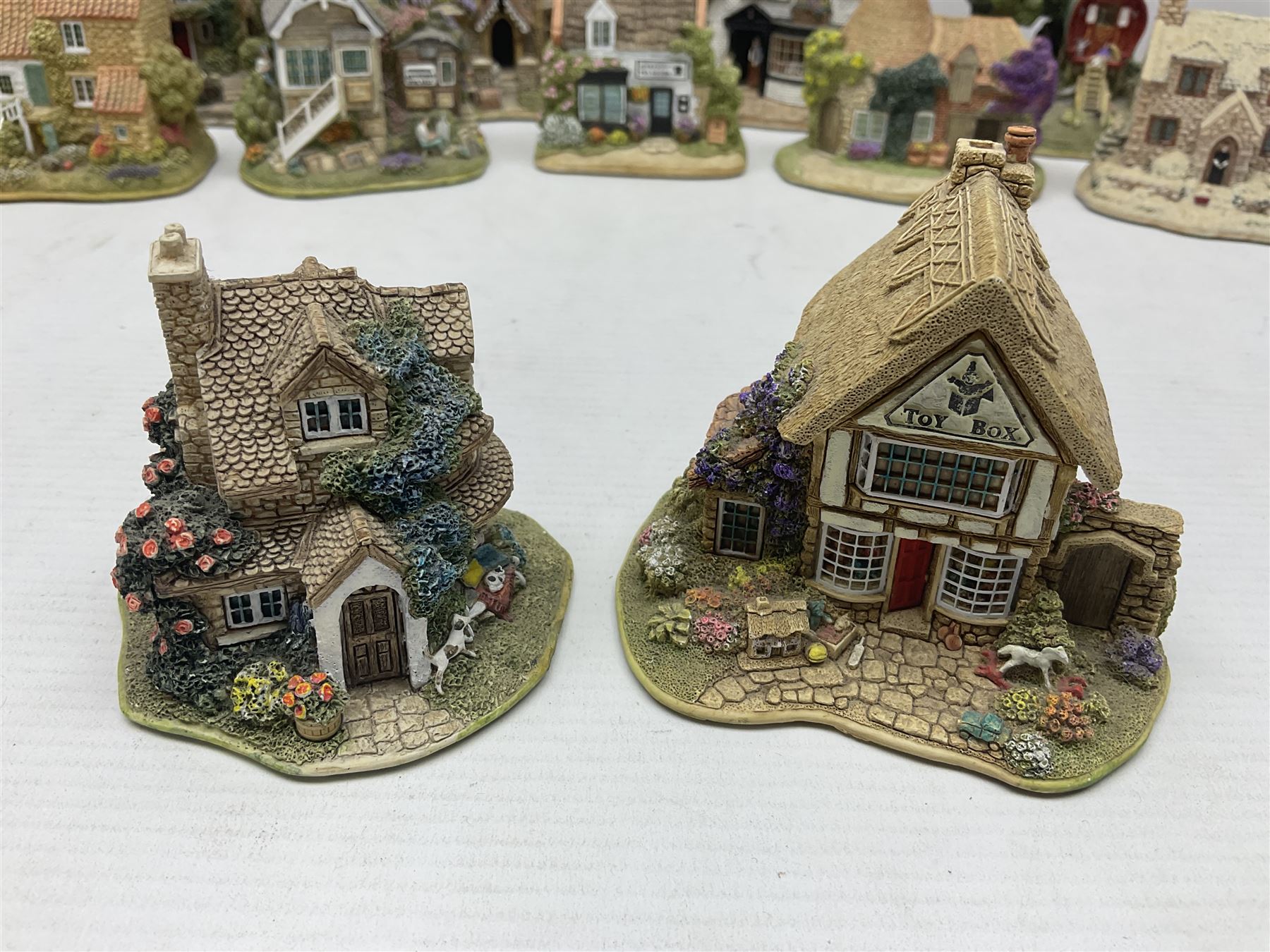 Twenty Lilliput Lanes, including The Right Note, Chatterbox Corner, Whistle Stop Gate, New Neighbours, Travellers Rest etc, all in original boxes
