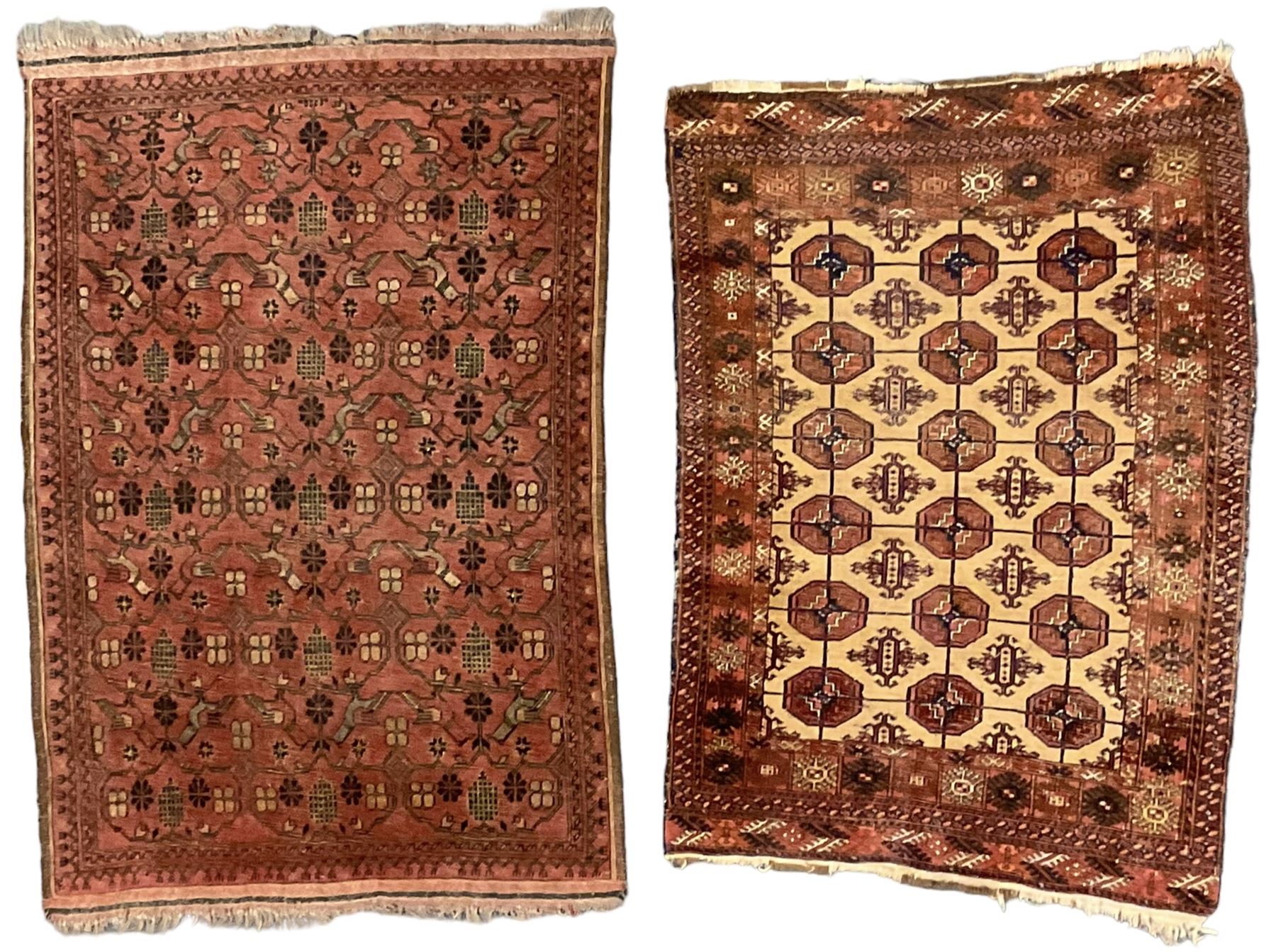Old Afghan red ground rug, decorated with repeating bird motifs, the guarded border with candelabra pattern (150cm x 104cm); and antique Afghan burnt orange ground rug, field decorated with octagonal lozenges, repeating geometric border (134cm x 95cm) (2)