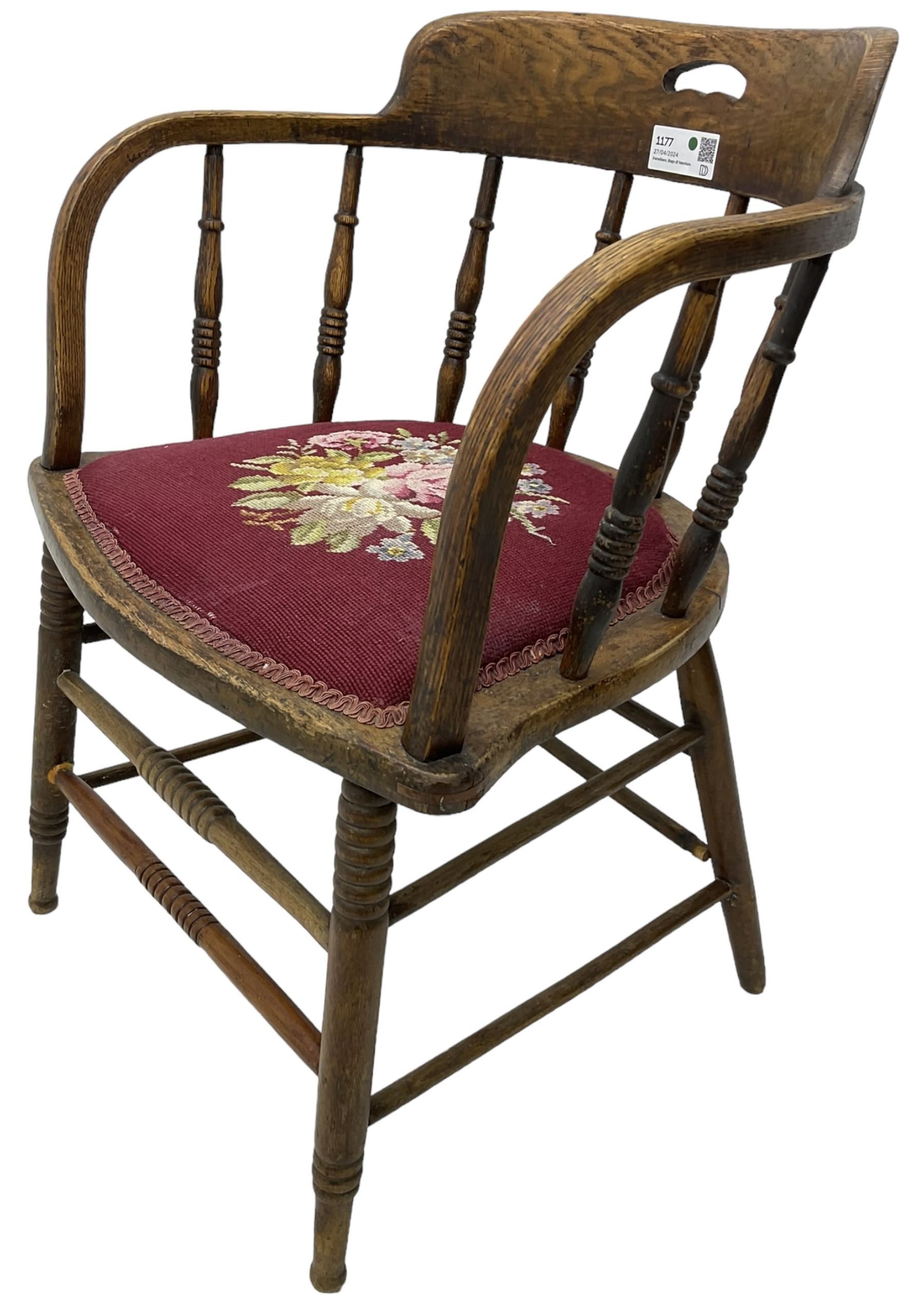 Early 20th century American oak smokers bow tub armchair, shaped cresting rail with pierced handle over ring turned spindle back, seat upholstered in pink tapestry fabric (W56cm, H73cm); small 20th century walnut occasional table on turned supports (W43cm, H70cm, D33cm)