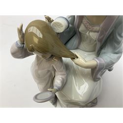 Two Lladro figures comprising Beautiful Tresses no 5757 and Great Expectations no 5650, both with original boxes, largest example H29cm