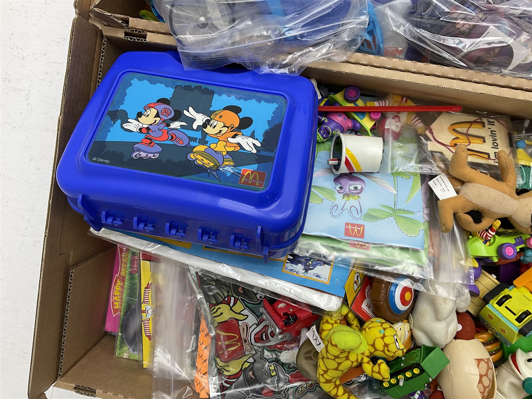 Large quantity of Mcdonalds toys to include Matchbox in four boxes