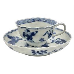 18th century Chinese blue and white Kangxi teacup and saucer, decorated with dancing figures, four character Kangxi mark beneath, saucer D10cm