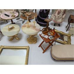 Dolls house furniture, including sofa, chairs, foot stools, fireplace, sideboards, five figures, mirrors, paintings and accessories