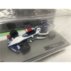 Panini Formula 1 The Car Collection - twelve die-cast models including ten in unopened packaging with periodical; all models in plastic display boxes; and eight other boxed die-cast models of racing cars by Corgi, Onyx, Classico, Minichamps etc (20)
