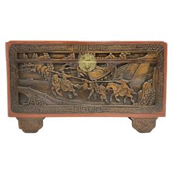 Mid-20th century Singapore camphor wood blanket chest, heavily carved depicting battle scenes and cityscapes 