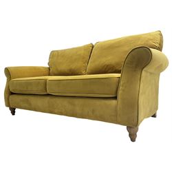 Next Furniture - traditional shaped three-seat sofa, upholstered in mustard velvet, rolled arms with pipping, on turned front feet