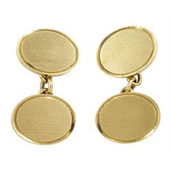 Pair of 9ct gold cufflinks, with engine turned decoration, Chester 1960