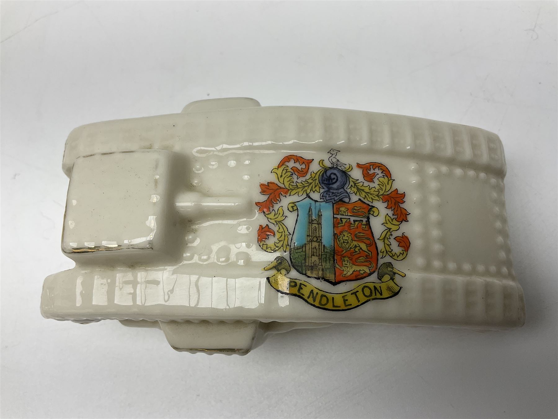 Ten WW1 crested china military models of tanks and field guns; various makers including Goss, Grafton China, Arcadian China, Savoy China etc; various crests including Portsmouth, Brighton, Pendleton, Paignton, Cowes, Flamborough etc (10)