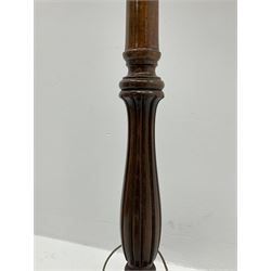 Oak standard lamp with fabric shade, inset carved detail on turned support, pad feet