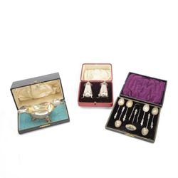 Edwardian silver sauce boat, of typical plain form with shaped rim, with flying C scroll handle and upon three pad feet, hallmarked Birmingham 1907, maker's mark worn and indistinct, together with a pair of Edwardian silver cruets, of urn form, upon three pad feet, hallmarked Horace Woodward & Co Ltd, Birmingham 1905 and a set of six silver apostle spoons, with matching sugar tongs and sugar sifting spoons, some hallmarked Miller Bros, London 1895 and Charles Boynton, all contained within fitted cases