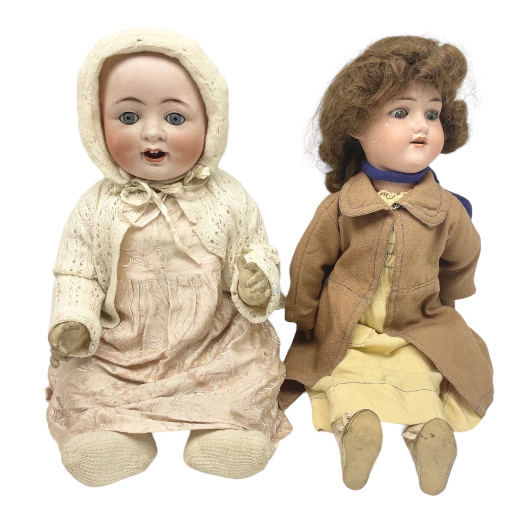 Catterfelder Puppenfabrik Germany bisque head baby doll with moulded hair, sleeping eyes, open mouth with teeth and trembly tongue, and composition body with jointed limbs; marked 'C.P. 208/50 V S' H50cm; together with an Armand Marseille bisque head doll with applied hair, sleeping eyes, open mouth with teeth and composition body with jointed limbs; marked 'Made in Germany Armand Marseille 390n D.R.G.M. 246/1 A. 6 M.' H56cm (2)