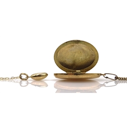  9ct gold locket pendant necklace and a 9ct gold coffee bean pendant necklace, hallmarked or stamped, approx 7.8gm  