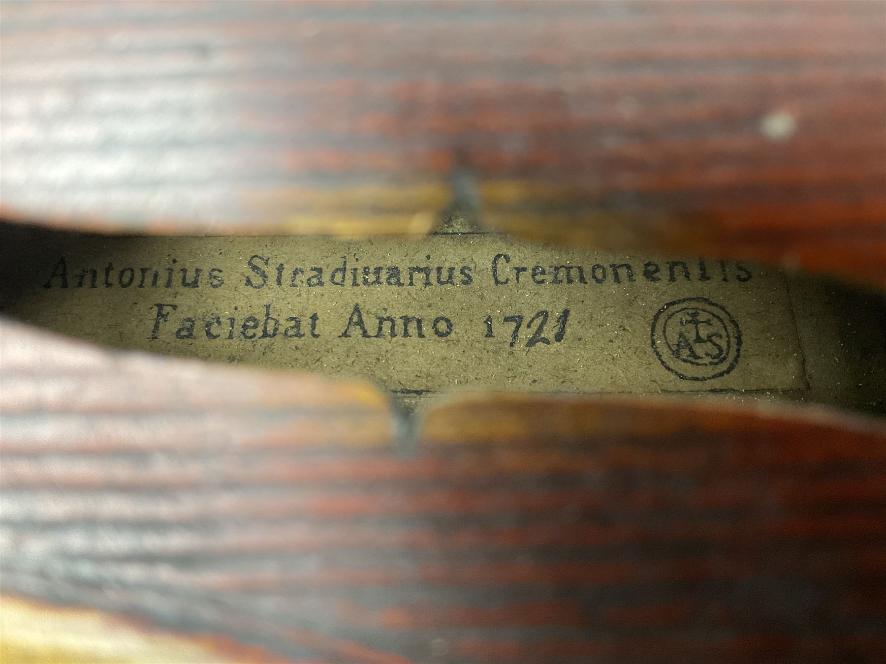 Late 19th century French three-quarter size 'Conservatory' violin with 34cm two-piece maple back and ribs and spruce top, the peg box inscribed 'Conservatory Violin Straduari', bears label 'Antonius Stradiuarius Cremonensis Faciebat Anno 1721' L55.5cm overall; in ebonised wooden 'coffin' case