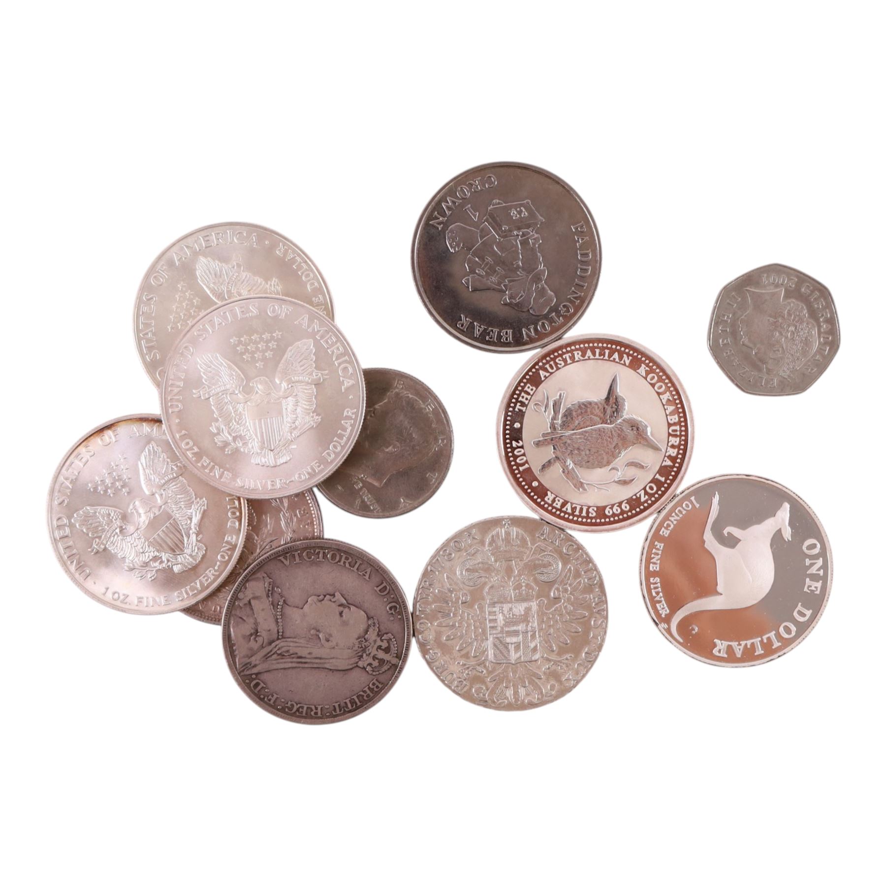 Eight silver coins, comprising two Queen Elizabeth II Australia one ounce fine silver one dollar coins, 1998 'Kangaroo' and 2001 'Kookaburra', three United States of America one ounce fine silver one dollar coins, 1999, 2000, and 2001, United States of America 1889 'Morgan' silver dollar, Queen Victoria 1891 silver crown, and Maria Theresa thaler, and four further coins