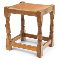 Mouseman - 1950s dark oak dressing table stool, the rectangular top with tan leather seat,...