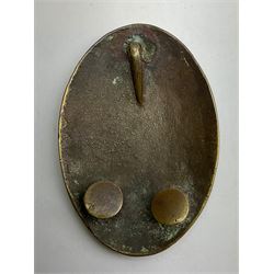 George III the Loyal Macclesfield Volunteer Infantry shoulder belt plate, of convex oval form, the obverse engraved with a crown over entwined initials LMV, the reverse with a single hook and fixing studs, H9cm, W6cm