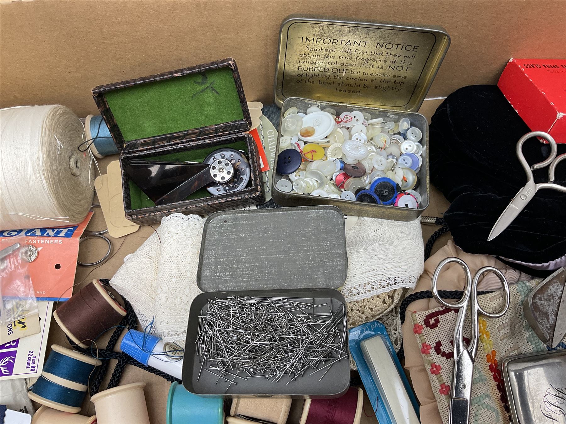  Victorian sampler worked with the alphabet by Carrie Monkman 1886, Victorian silver-plated cigarette case, Carlo simulated tortoiseshell motorised fan in case, Folding Opera Glasses, two chrome leaping Jaguar brooch and matching pin badge, quantity of sewing threads, lace etc