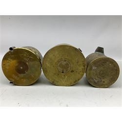 Trench Art - three WW2 brass shell case ashtrays, one mounted with Royal Artillery cap badge and button and one mounted with RA button; together with a pair of place name holders each formed from a Royal Artillery cap badge (5)
