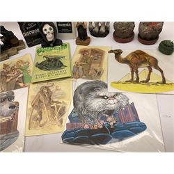 Terry Pratchett Discworld figures, designed by Clarecraft, comprising Death and Granny Weatherwax, DW90, Deathhead DWE8, Dried-frog pill box, boxed, DW63, Death as Beau Nidle, boxed, DW88, Agnes Nitt DW68, Detritus, DW22, Bonsai mountain, DW78, Volcanic bonsai mountain, boxed, DW79, Bonsai mountain valley, DW80, together with the Discworld mapp, and a collection of Terry Pratchett cards.  