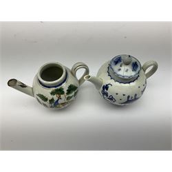 Two 18th century miniature or toy pearlware teapots, the first example lacking cover decorated with an exotic bird, the second with cover painted in underglaze blue with hut and fence, second example approximately H8cm