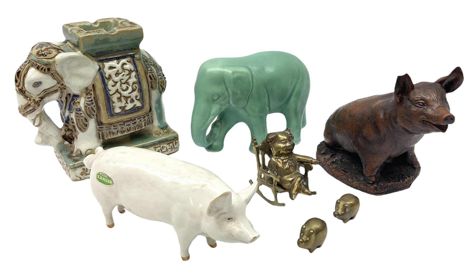 Beswick pig CH Wall CH Boy 53 figure, Priory Castings model of a seated pig, majolica ashtray in the form of an Indian elephant, elephant figure in green glaze and brass figures of pigs, Beswick pig L16cm