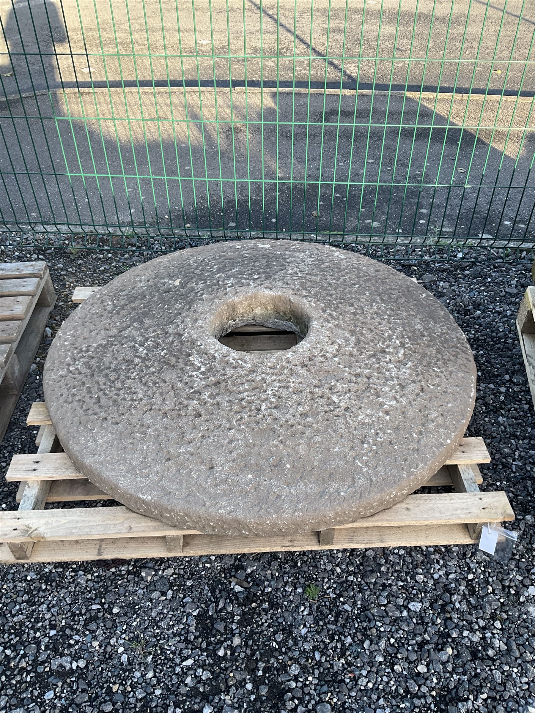19th century circular mill stone, dome shaped - THIS LOT IS TO BE COLLECTED BY APPOINTMENT FROM DUGGLEBY STORAGE, GREAT HILL, EASTFIELD, SCARBOROUGH, YO11 3TX